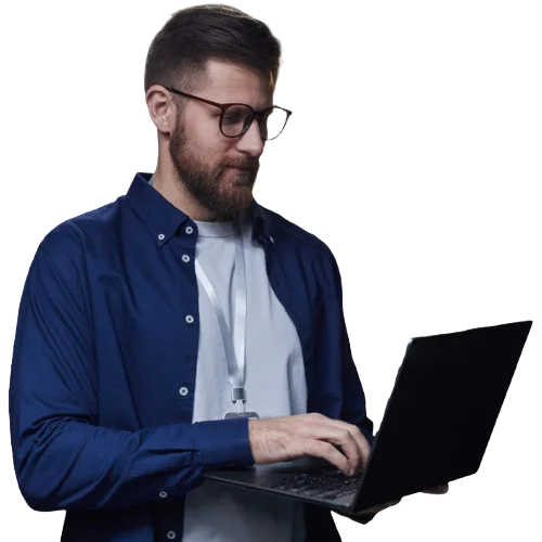 hombre de lentes con laptop en las manos